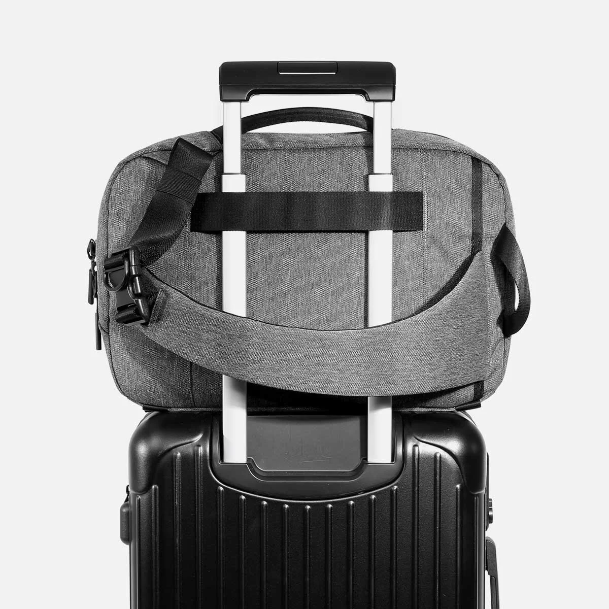 Luggage handle pass-through for convenient carrying.