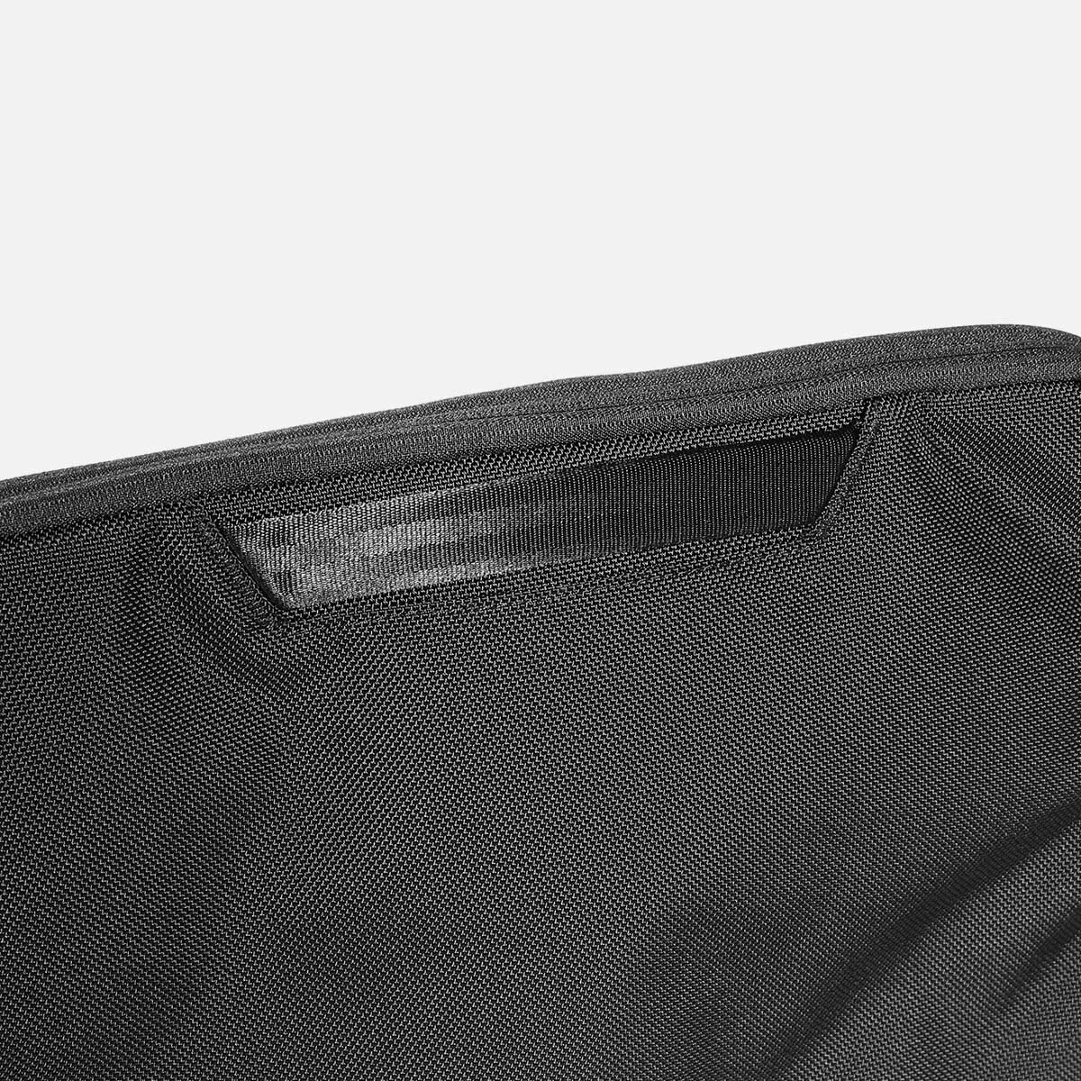 Padded, quick-grab top handle.