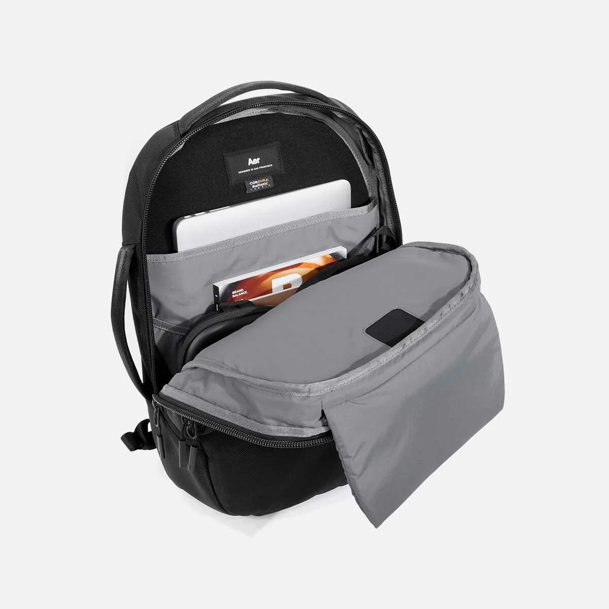 Padded and suspended laptop pocket with soft lining (fits up to MacBook Pro 16").