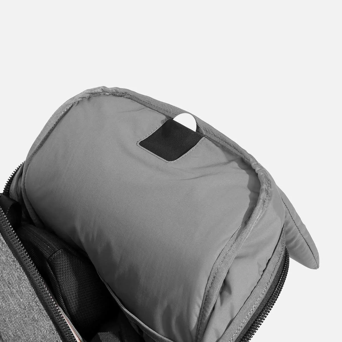 Smart tracker pocket designed for AirTags or Tile trackers.