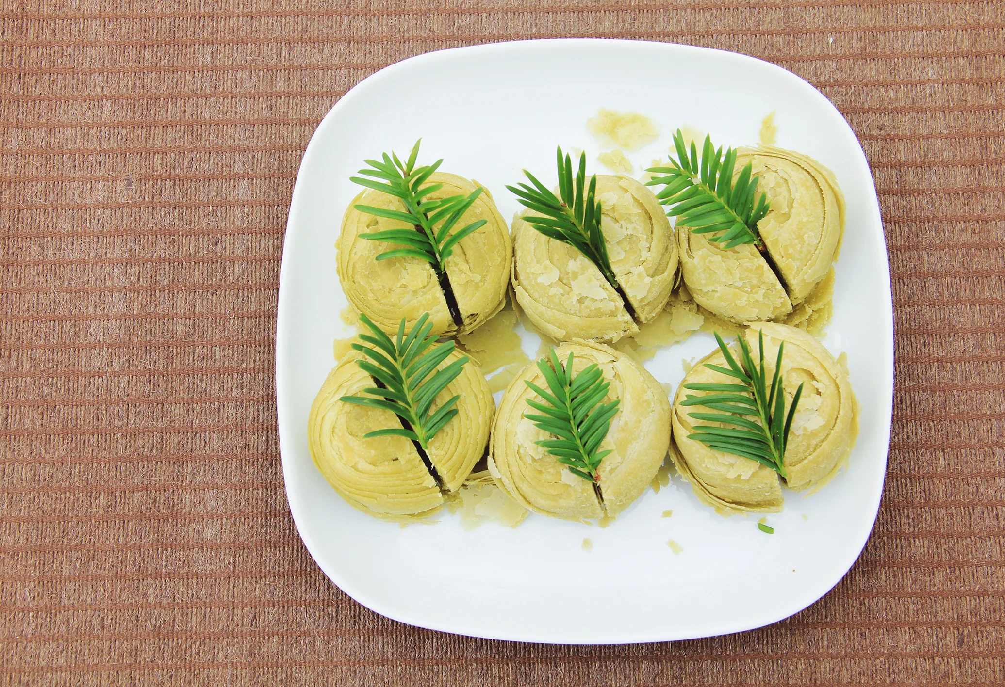Lung Jing Tea Bean Cakes with Pine Sprigs