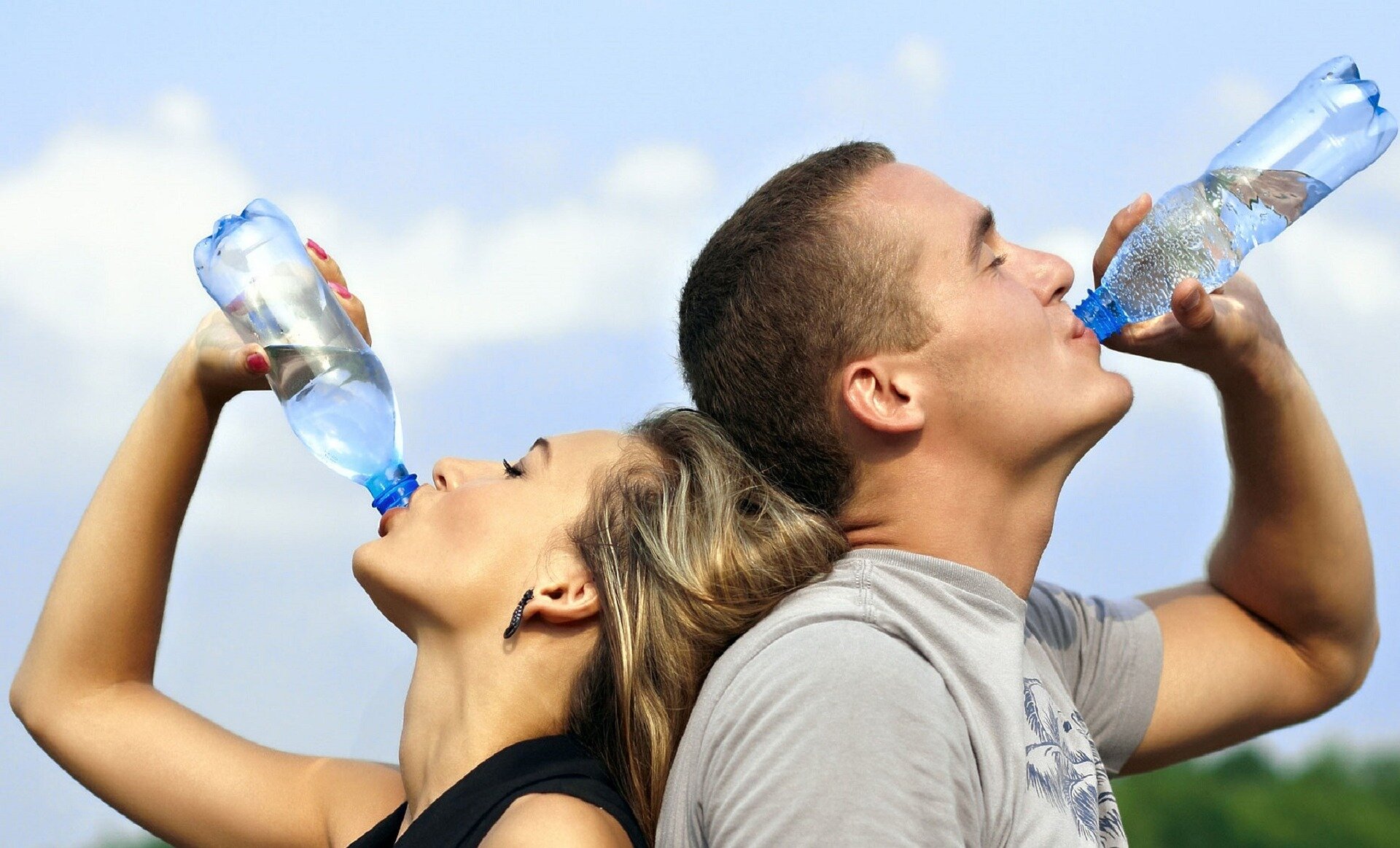 man-and-woman-drinking-bottled-water-pixabay-image.jpg