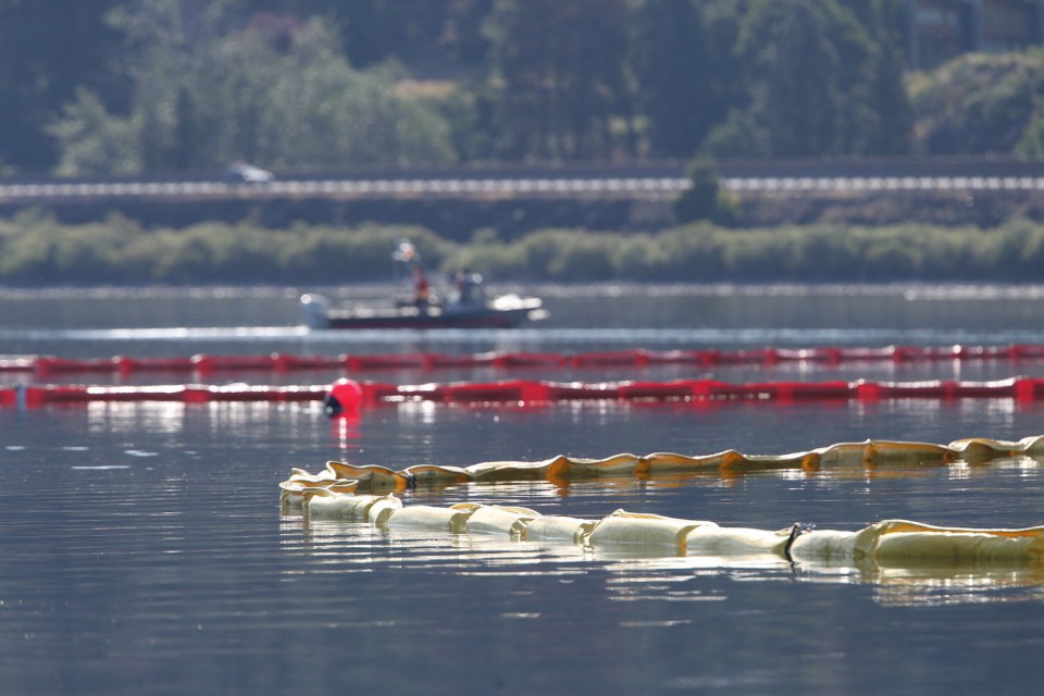 Rocky Creek had a light oil sheen after the derailment. Booms prevent oil from creeping elsewhere. Photo: WA Dept. of Ecology
