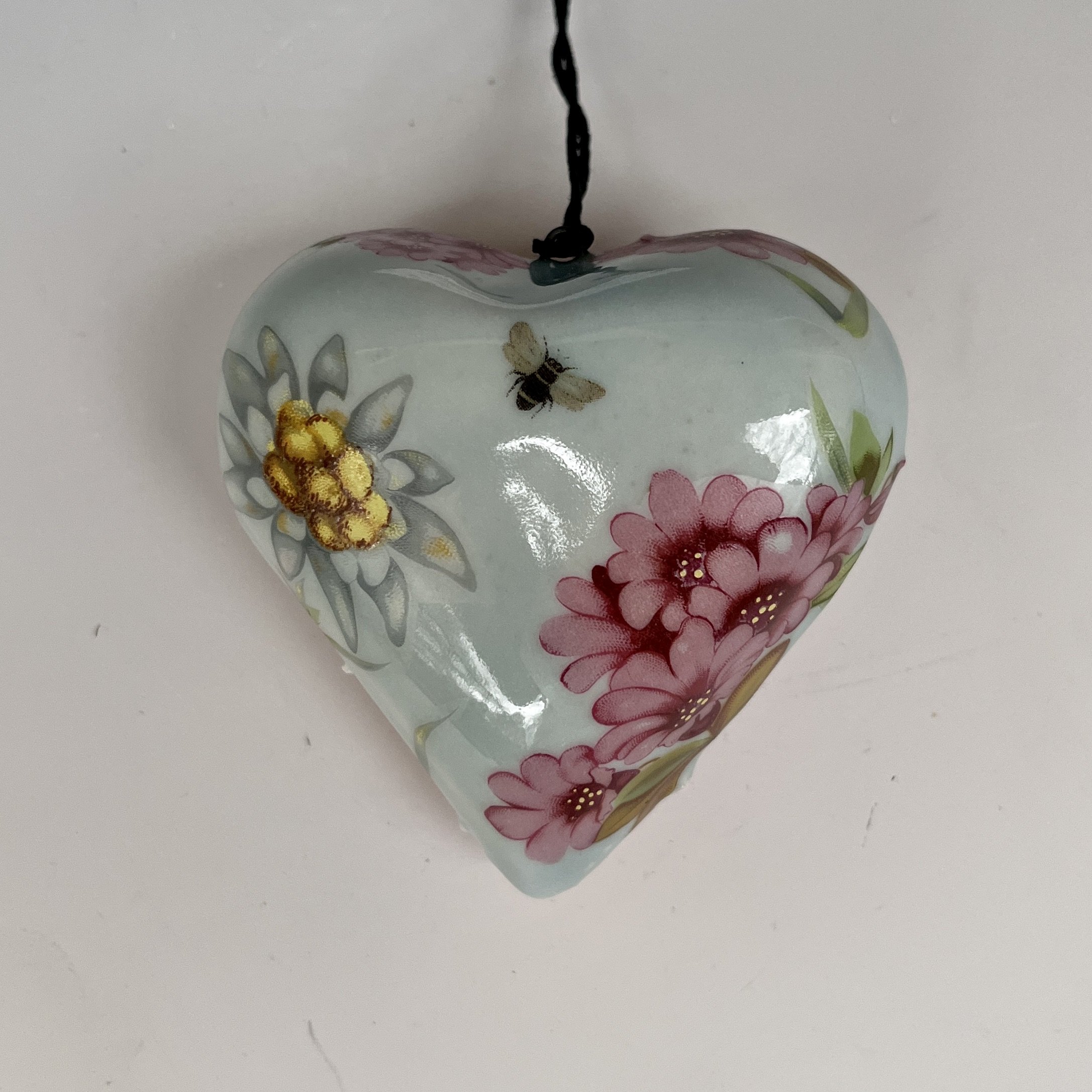 Gillian Park, "Celadon Heart", Hand built porcelain & porcelain with feldspar/molochite inclusions; underglaze patina; celadon glaze, gas reduction firing (cone 10); decals and lusters, multiple electric firings (cone 017), 1.75” x 3” x 2.75”
