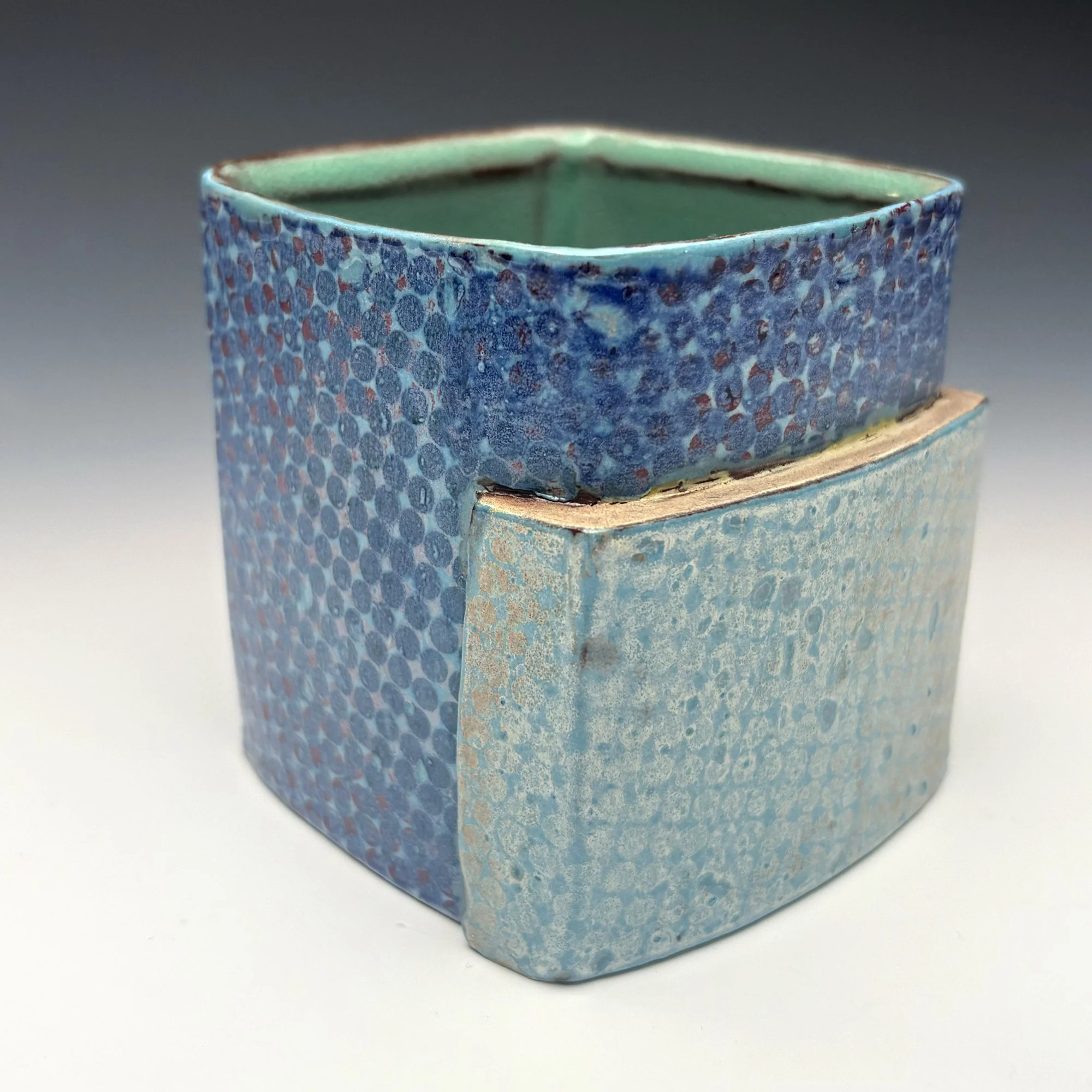 Marty Fielding, "Square Rocks Glass"	Handbuilt Cone 3 Red Clay, Slip Transfer, Soda Fired, 3"h x 3"w x 3"d