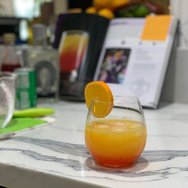 Been working to fully utilize our bar by trying out all the cocktail recipes in the Overwatch, WoW and Hearthstone cookbooks! This one is Sombra&rsquo;s Dorado Sunset with fresh orange juice, sprite, tequila and a splash of grenadine.