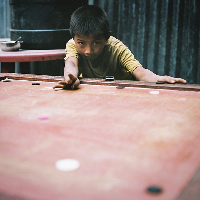 The Chhetchet karom striker... Each village seemed to have a board and some of these kids were good!