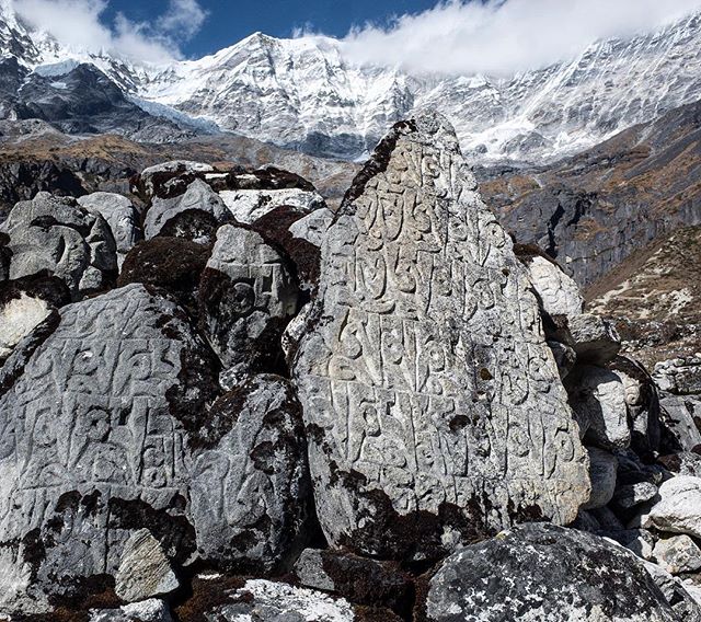 Mani stones; Carved prayers.