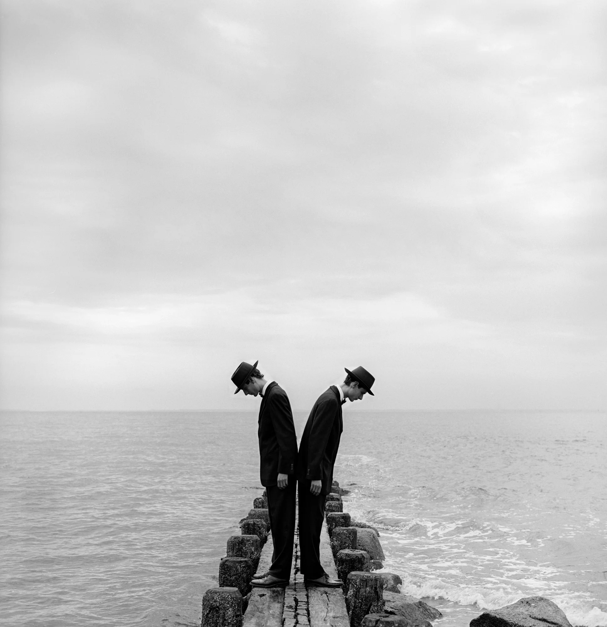 Twins Leaning Outward on Dock no.1, Sherwood Island, CT 1997 Silver gelatin print 27 x 27 cm (image) 56 x 66 cm (mount)