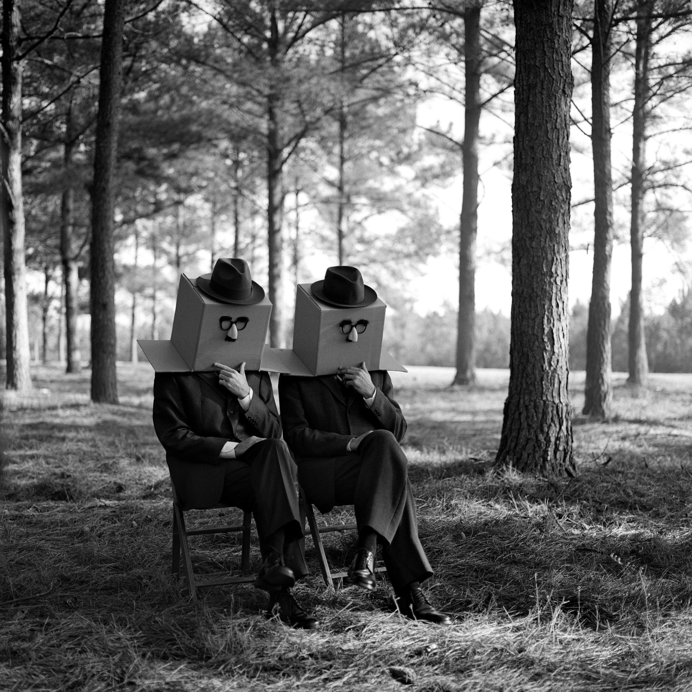   Men with Boxes on Head,   Brunswick, GA  2011 Archival pigment print 69 x 69 cm (image) 89 x 99 cm (paper) 