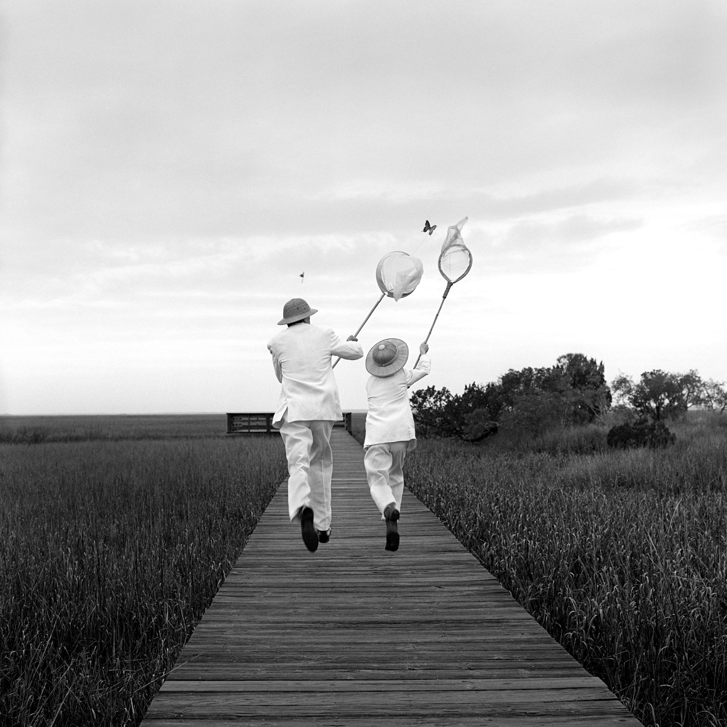   Gary and Henry Chasing Butterfly,&nbsp;Beaufort, SC  1996 Silver gelatin print 27 x 27 cm (image) 56 x 66 cm (mount) 