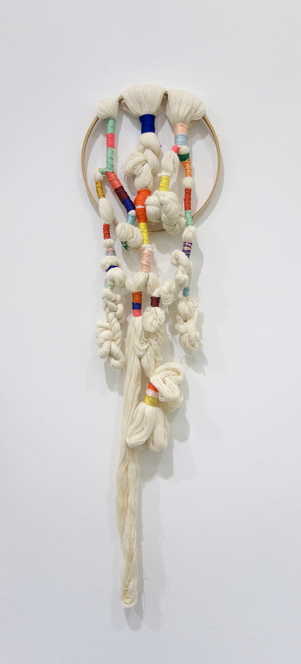 Izziyana Suhaimi, Cross Section of Bone I, 2015, Cotton thread; plaided and twisted on wooden hoop, H75 x W21 cm.jpg