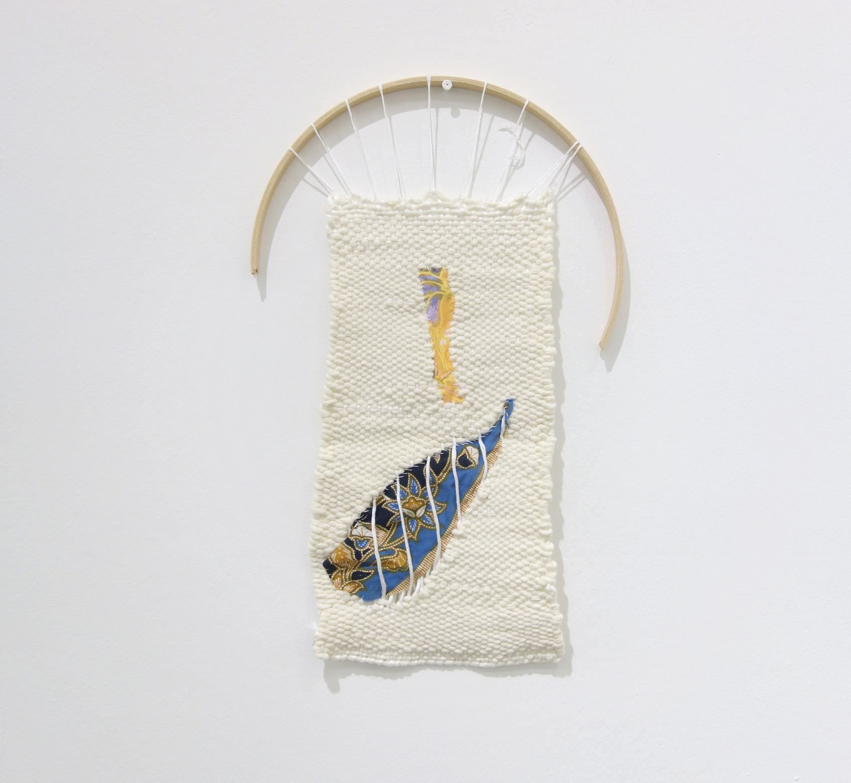 Izziyana Suhaimi, Cross Section of Bone IV, 2015, Cotton thread woven with found Batik on wooden arch, H41 x W26 cm.jpg