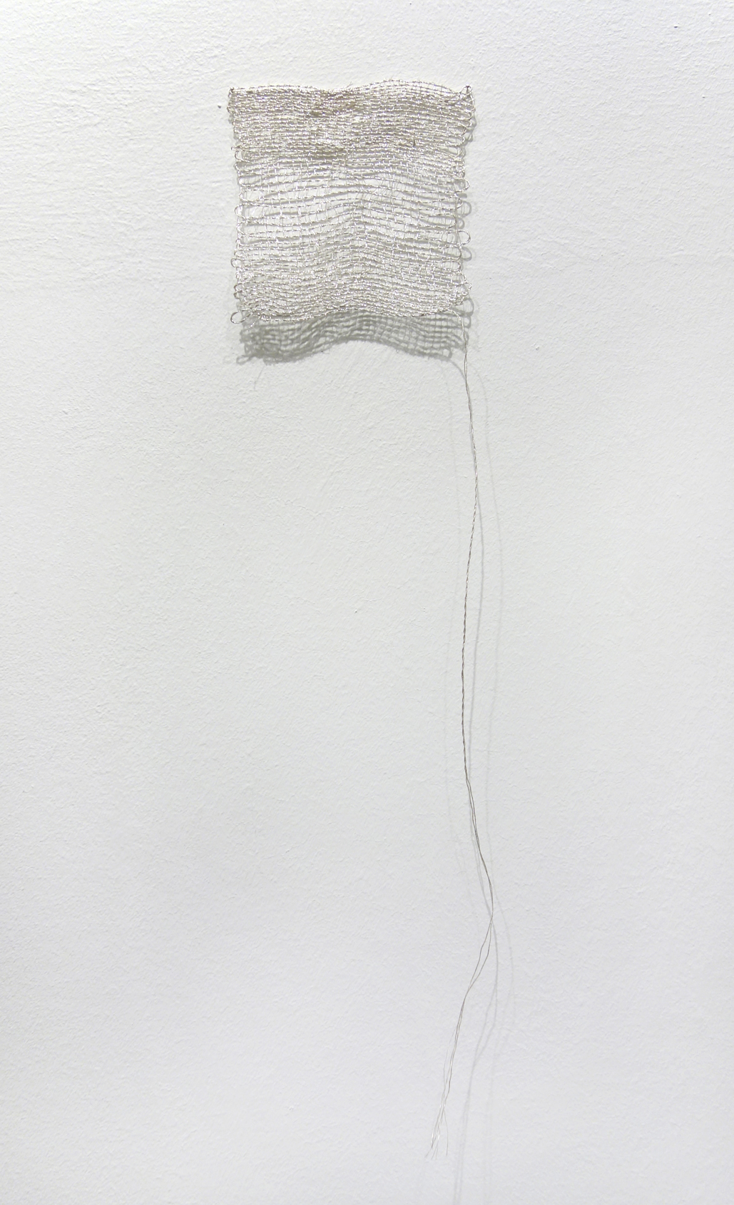 Izziyana Suhaimi, Small Studies of an Everyday Practice IV, 2014, Silver thread; woven, H43 x W11 cm.jpg