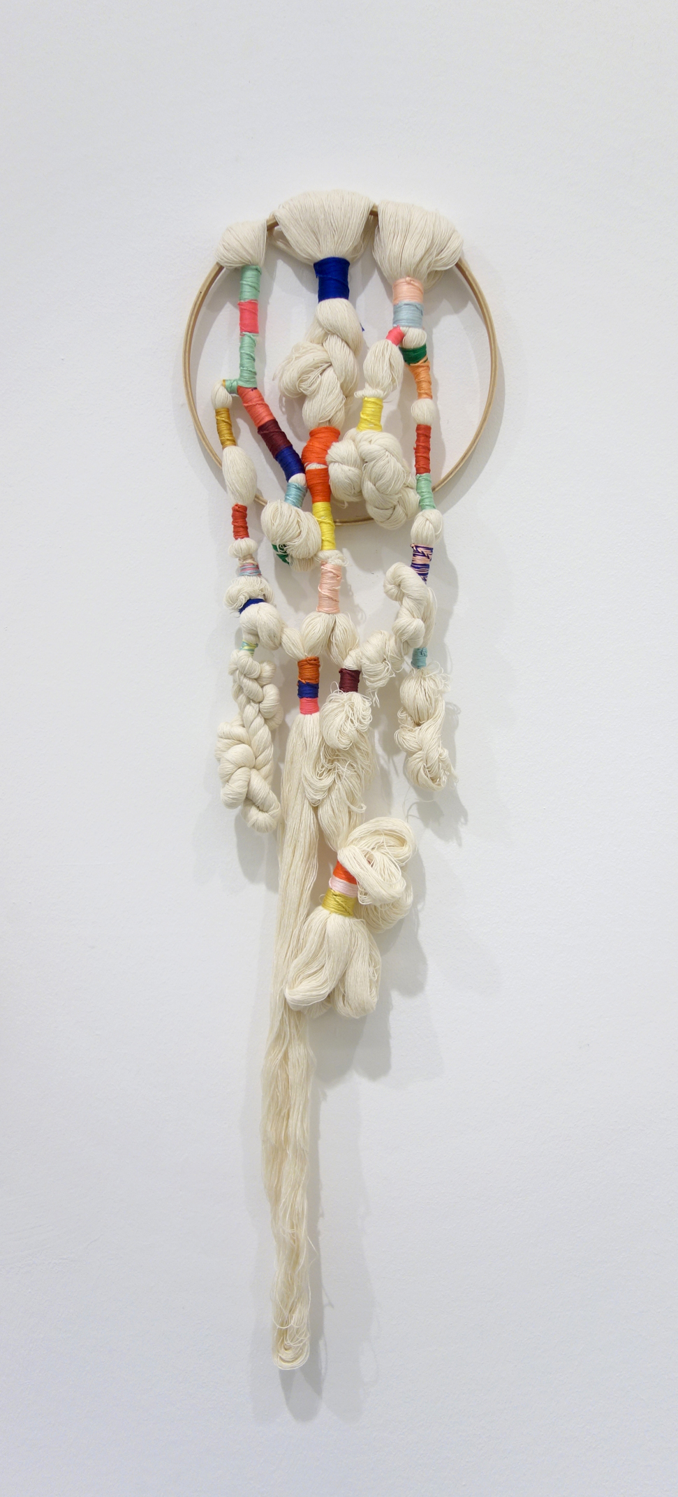  Izziyana Suhaimi  Cross Section of Bone I  2015 Cotton thread; plaided and twisted on wooden hoop H75 x W21 cm 