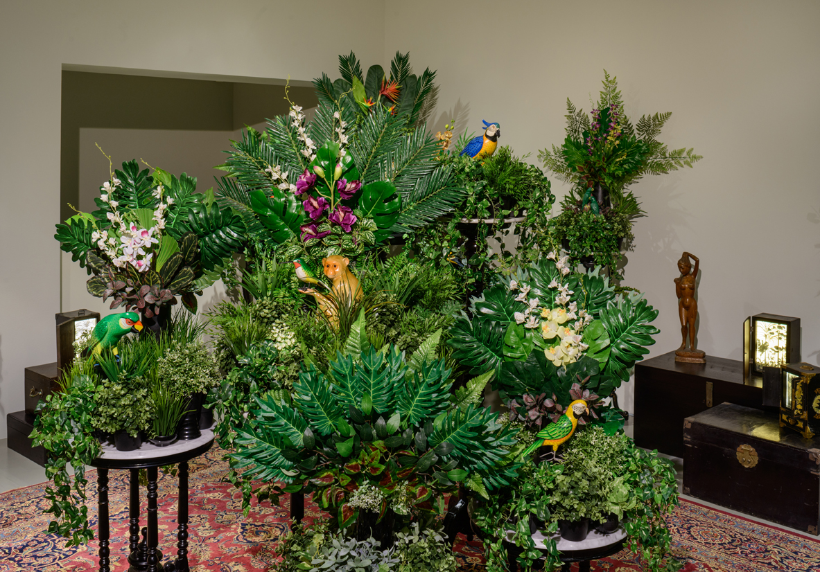  Installation View of  From the Tropics, With Love (2.1)  2016 Antique/reproduction antique wood and marble furnitures, artificial flowers, vases, pots, ceramic monkey and four wooden birds Dimensions variable Photo Credit:&nbsp;Fotograffiti (John Yu