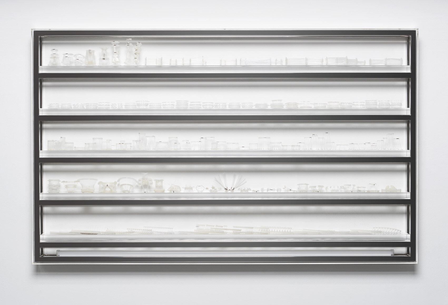  Grace TAN  Diversity and Variation  2020 Wall-mounted stainless steel and acrylic structure with LED light and objects made from polyamide and polypropylene tag pins and nickel-plated brass tubes H81 x W132 x D8.5 cm 