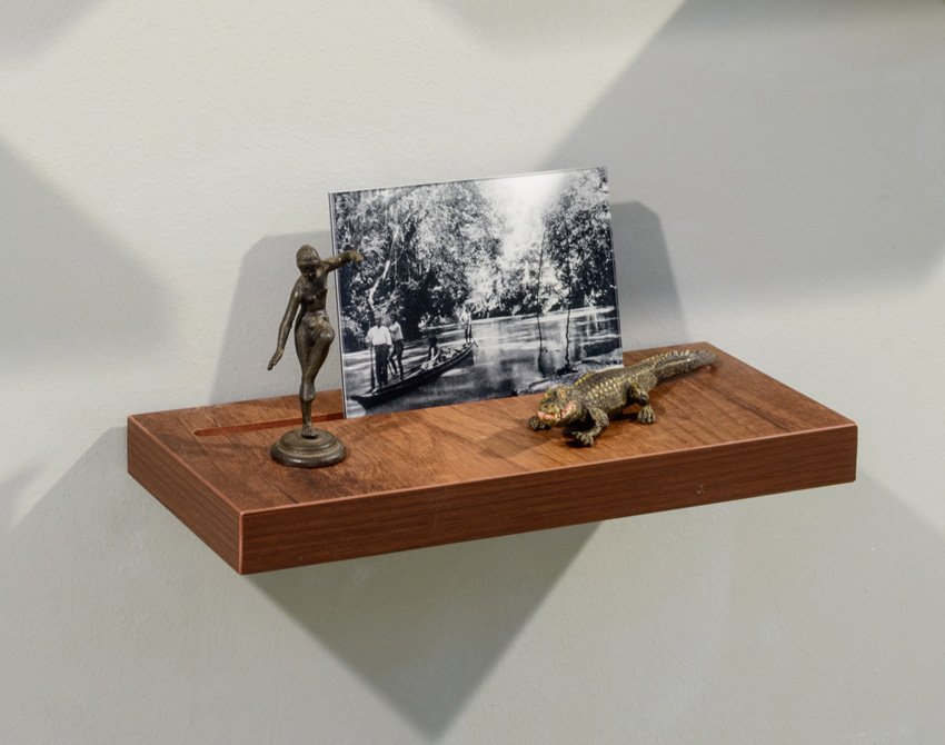 Donna ONG, Postcards from the Tropics (ii), 2016, Diasec print, wooden shelf, and tropical souvenirs (antique bronze statuette and vintage wooden crocodile), H13.3 x W32.1 x D13.5 cm. Credit-Fotograffiti (John Yuen).jpg