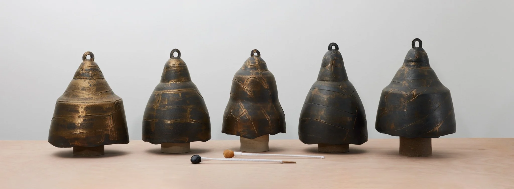  Jason Lim  Yingge  2024 Ceramics, wood, stone, rubber, waterproofing tape and medical gauze, performance documentation, and single-channel video (00:06:44) Edition of 2 + 1 Artist’s Proof Dimensions variable (installation) 
