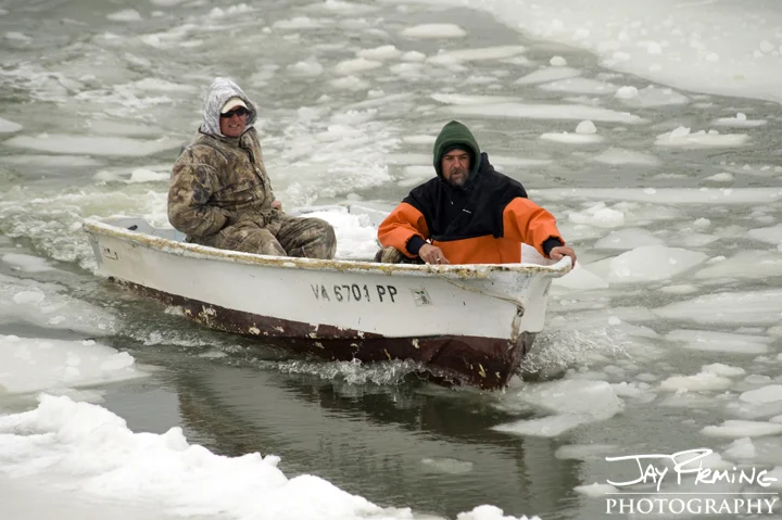 Tangier Island Watermen check their boats after a week of solid ice. February 2015 