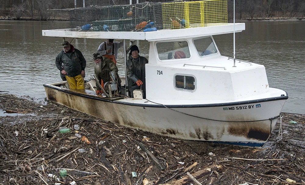 Havre de Grace watermen - Steve Lay, Buddy Sexton and Tim Mortus with fish pots used to target Yellow Perch near Perryville, Maryland. 