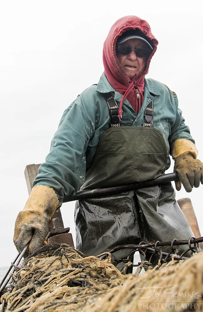 Leon McMann emptying the bag of the dredge. 