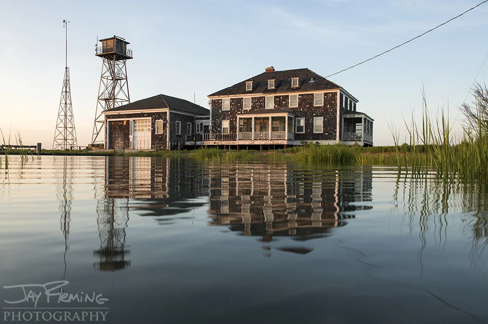 The decommissioned Coast Guard station on Cedar Island, now privately owned, is an icon to the Barrier Islands. The Coast Guard station is the last remaining structure of dozens that once stood on the island.
