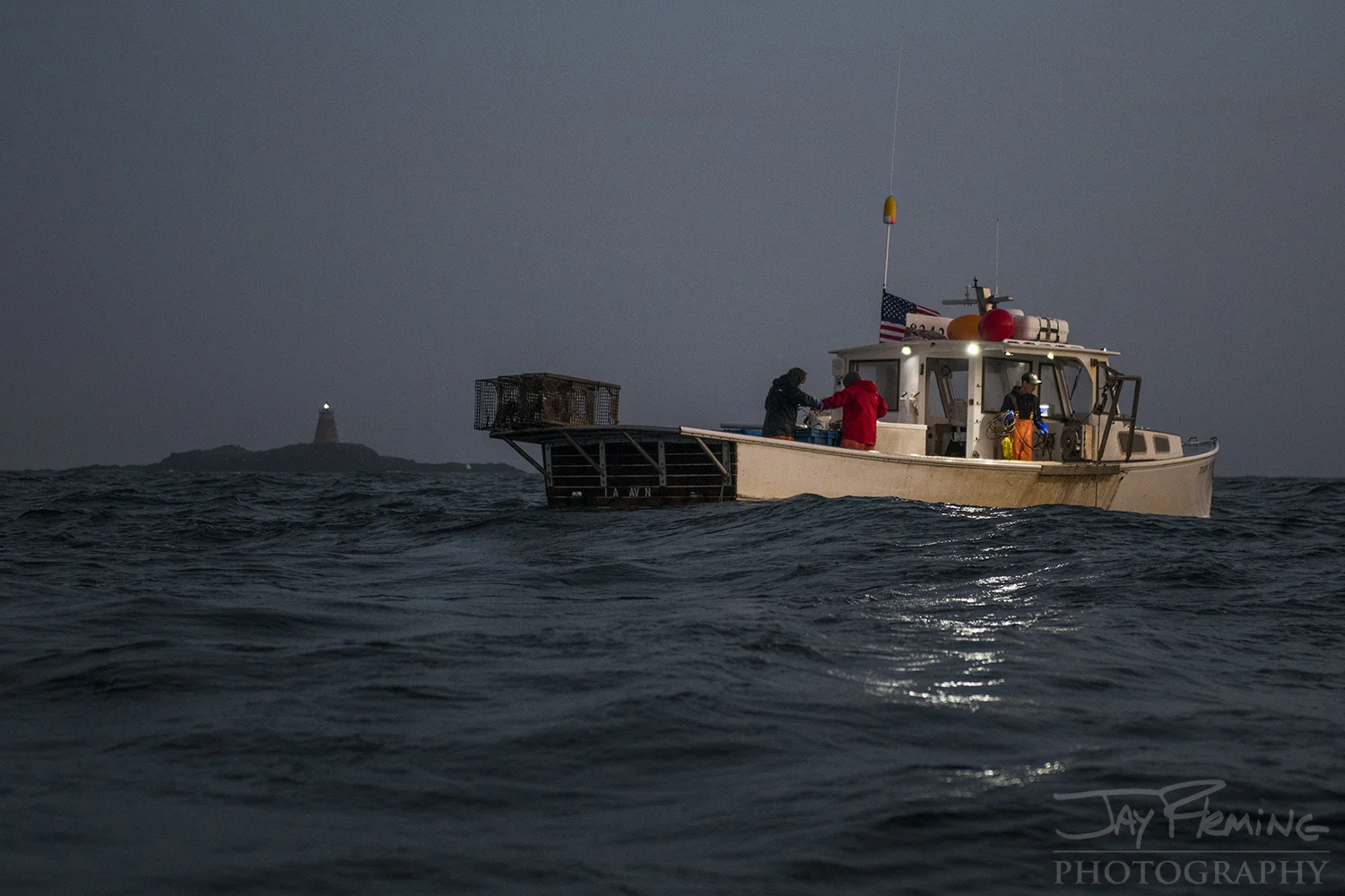 Jacob Watt working near Saddleback Light in Isle Au Haut Bay.