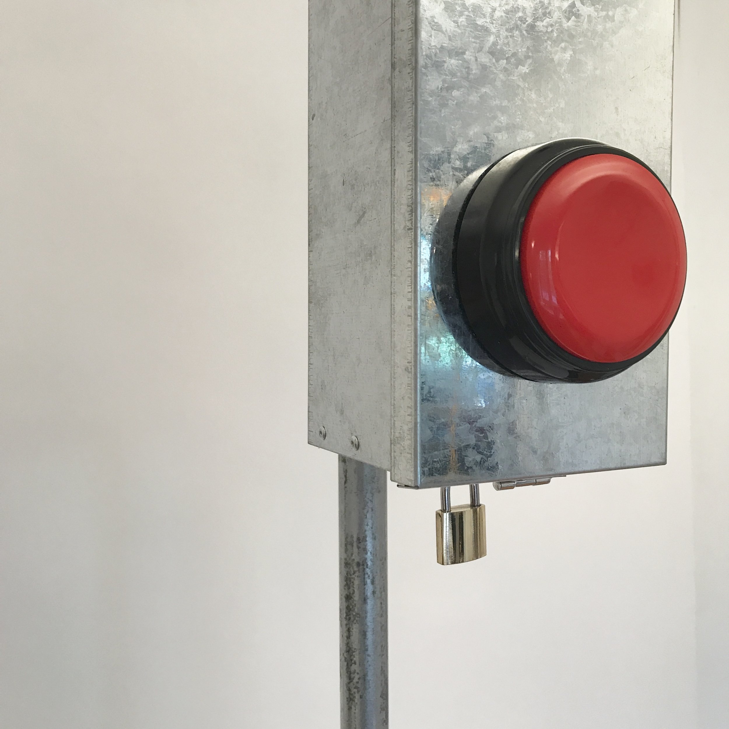  Doug Cross,  Push , detail, Metal box with push button, mounted on pole, 6’x6” 