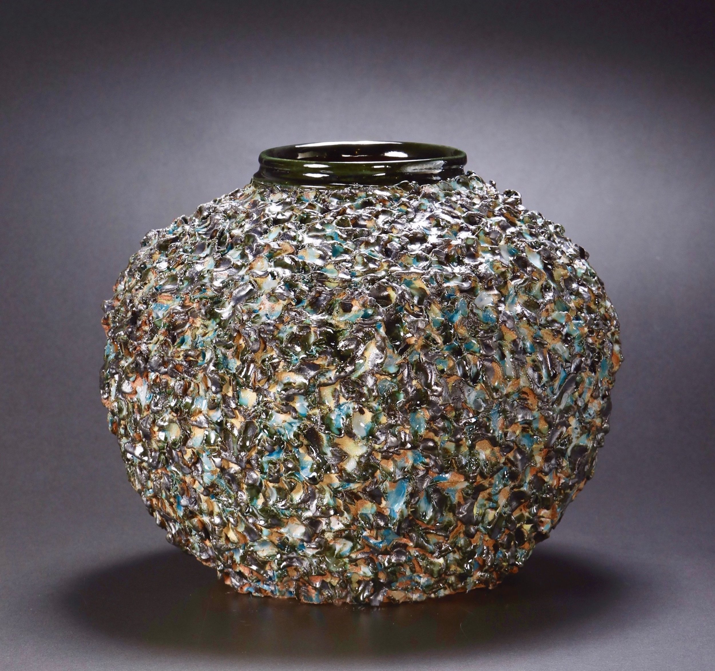  Mimi Howard,  Textured Globe #5 , glazed stoneware, 22x17x15 
