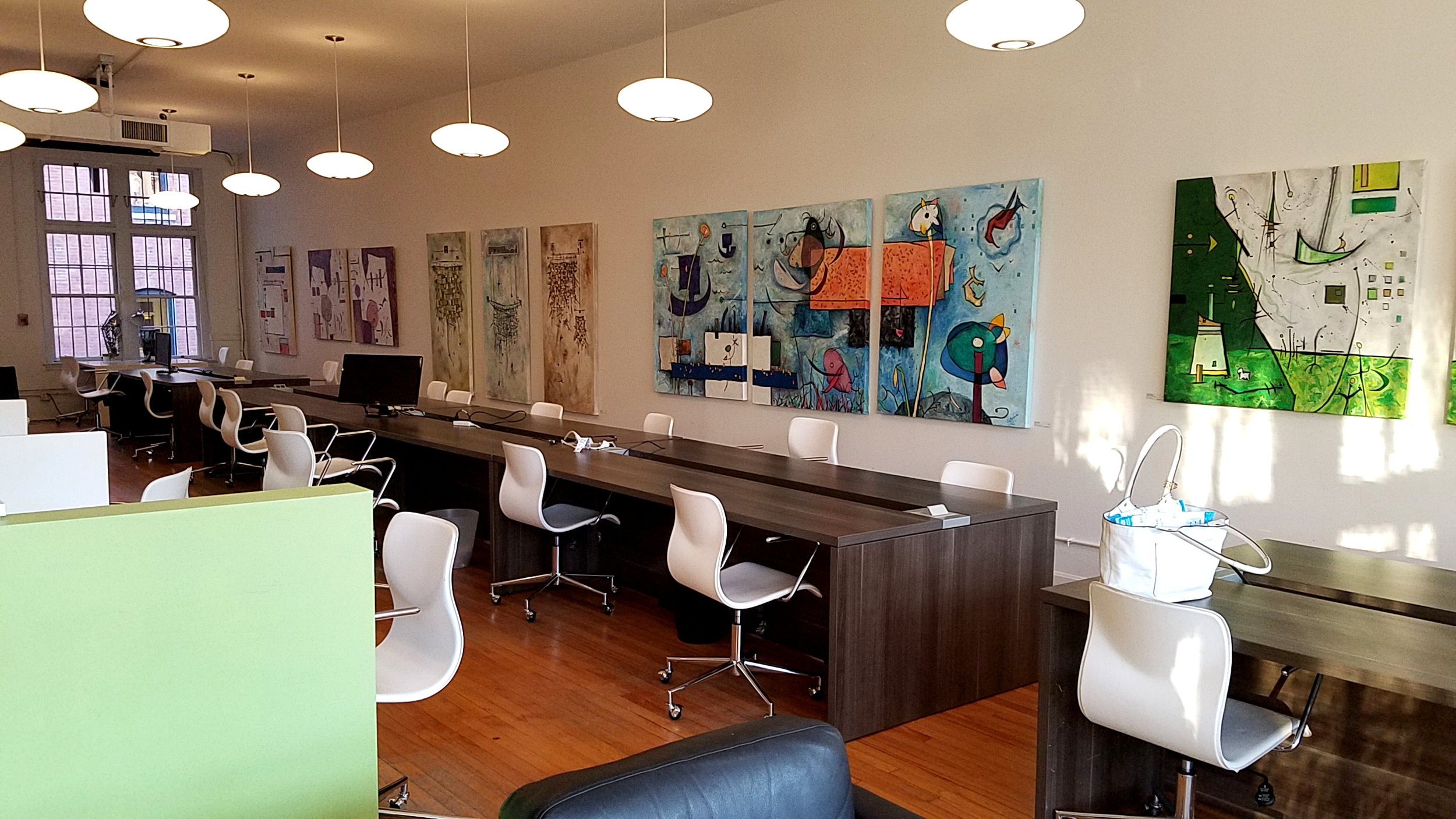 Installation view of Anita Loomis paintings at Oficio