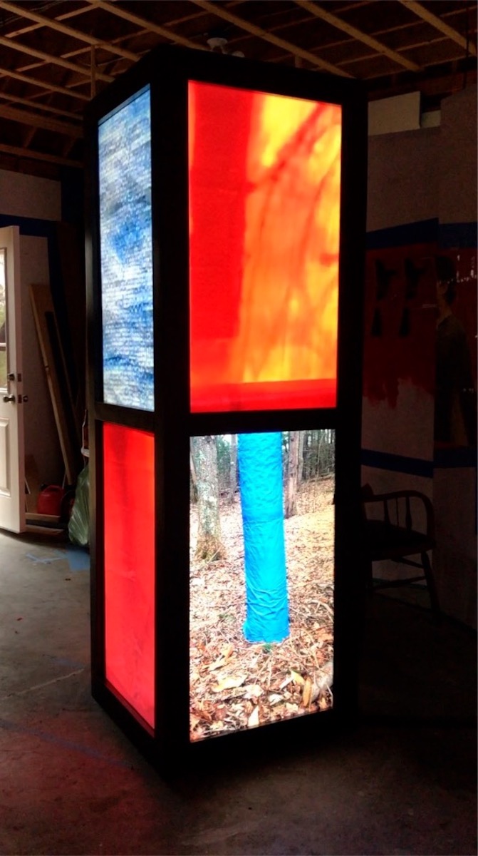  Joseph Fontinha,  Video Booth (Blue Tarp Summary),  video Sculpture, 7’x28”x28” 