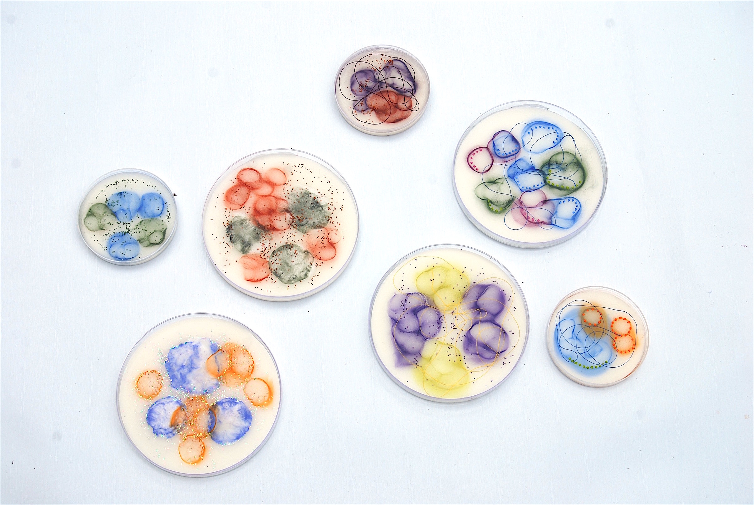  Hartung,  Cell Samples ,  Grouping 1,   Encaustic, pastel, petri dish, thread, glass balls, 4” diameter, 6” diameter 
