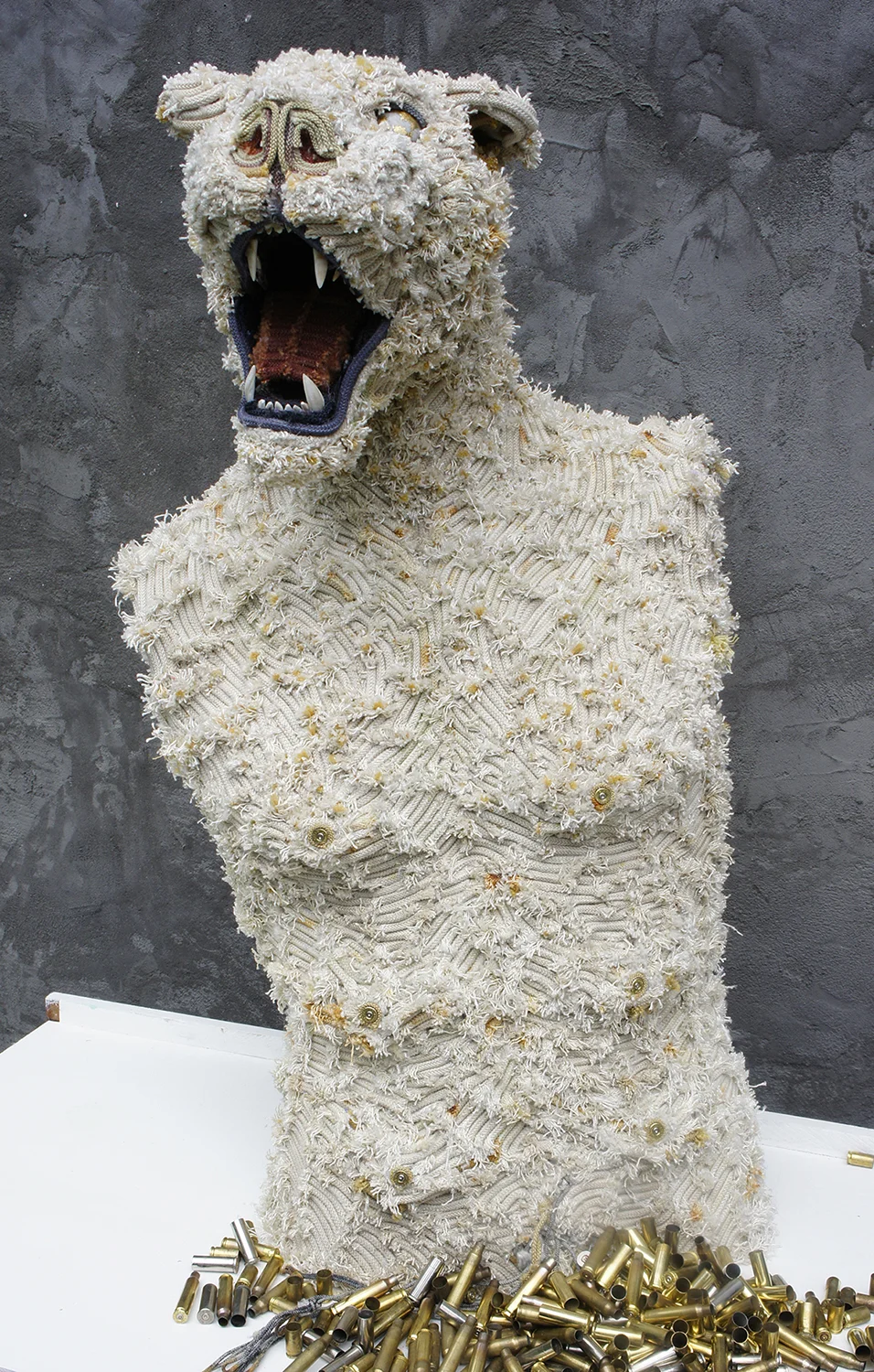 Gin Stone sculpts found materials into colorful creatures