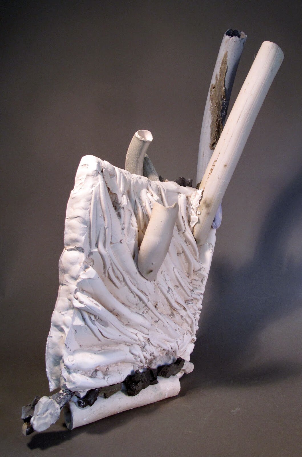  Sara Fine-Wilson,  Up and Over (DETAIL),  Clay, Plaster, Metal, Found Objects, Silicone, 20x11x7 