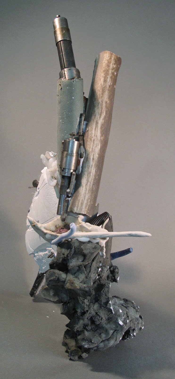  Sara Fine-Wilson,  Milk Bone with Rubble (DETAIL),  Clay, Plaster, Metal, Found Objects, Silicone, 17x17x6 