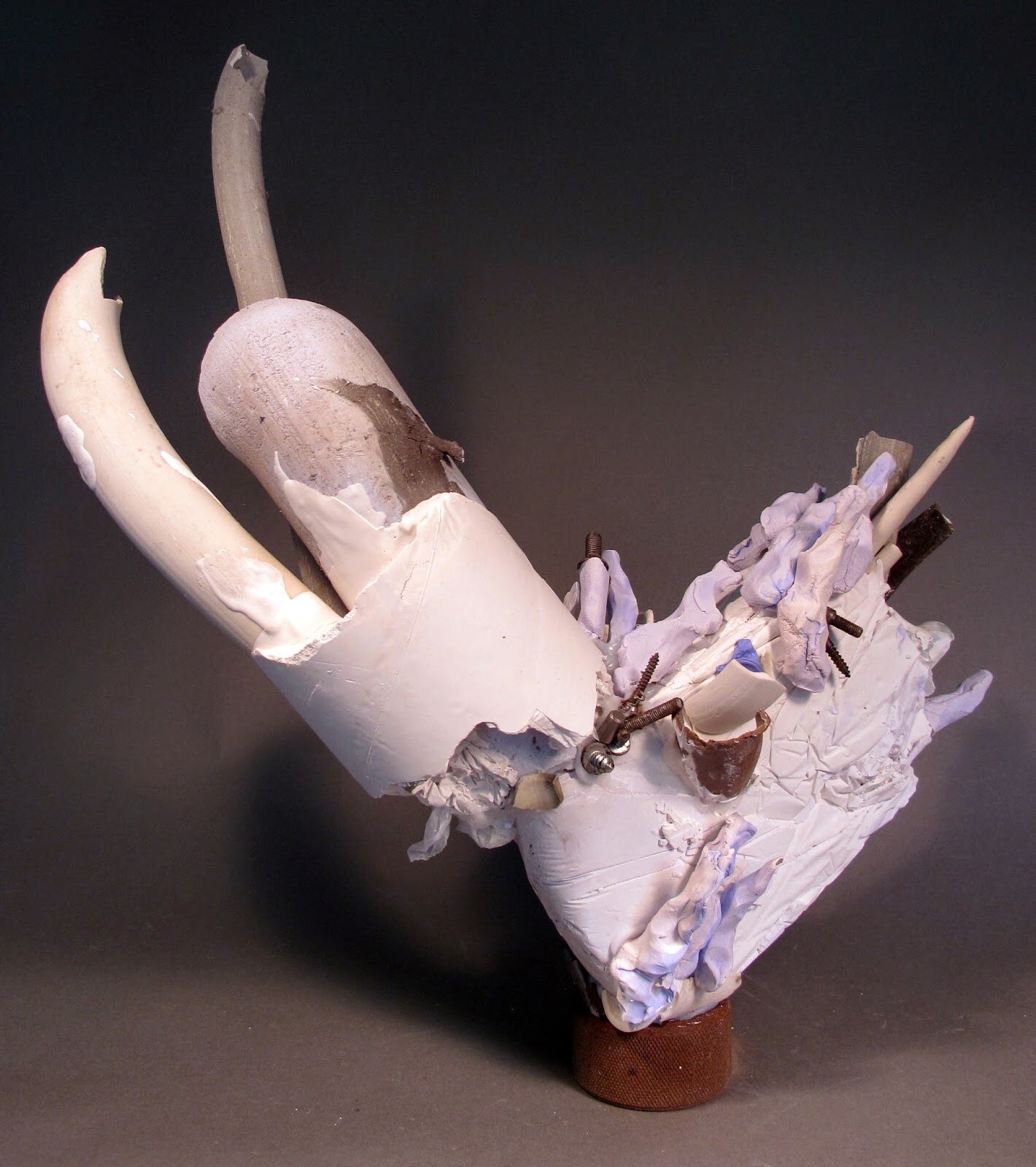  Sara Fine-Wilson,  Milk Bone Balance (DETAIL),  Clay, Plaster, Metal, Found Objects, Silicone, 21x21x7 