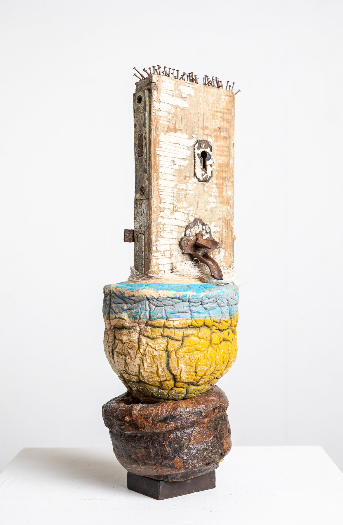    Smithereens     found objects, steel; 14 x 6 x 4 inches 