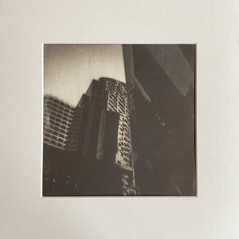 Cityscape from a Polaroid scanned made into a kallitype print.