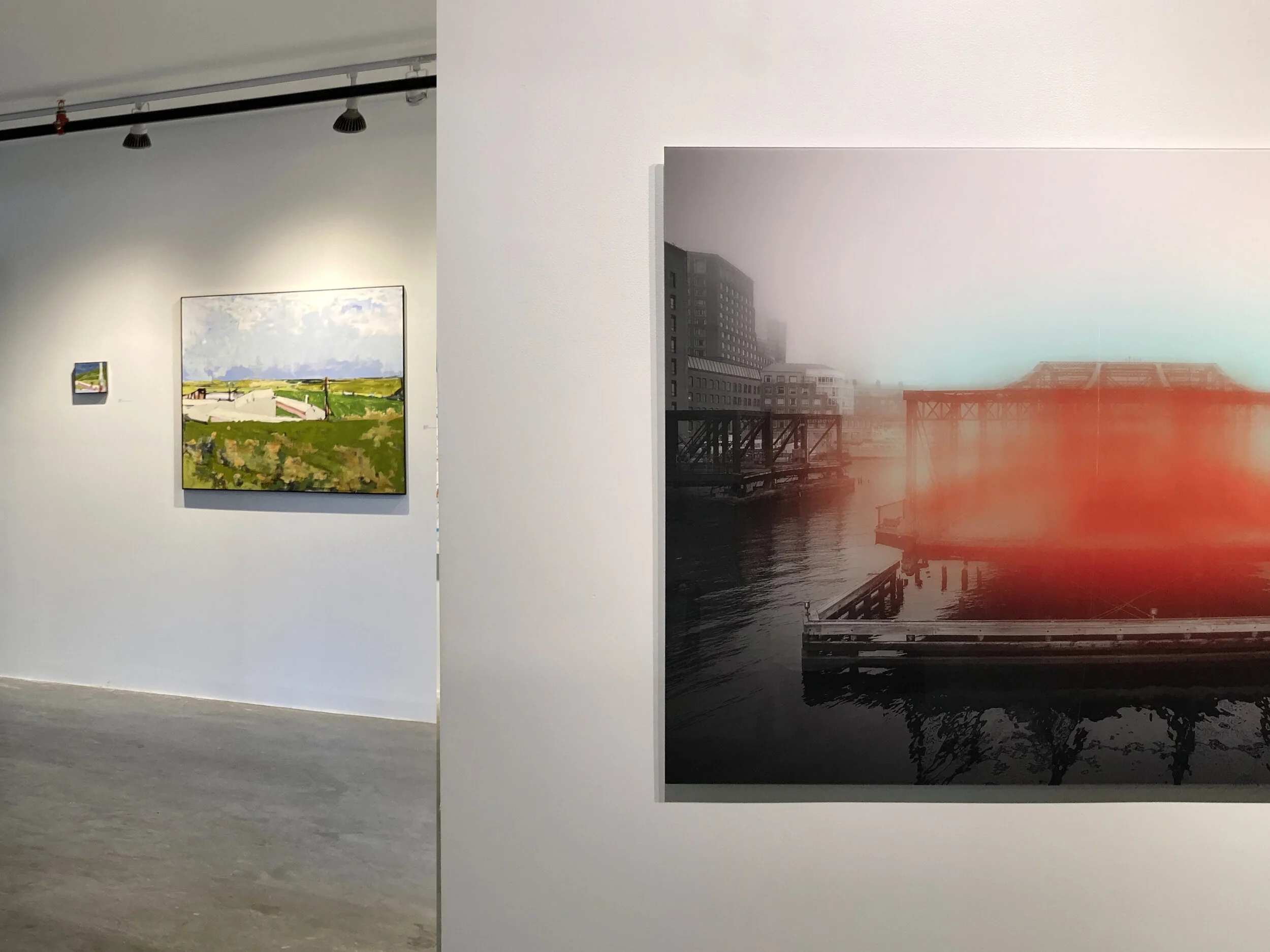 Installation Views Left: "Adams I" and "Adams VI" by John Daly Right: "Bridge with Orange and Pthalo Blue, 8:24 am" by Jeffrey Heyne