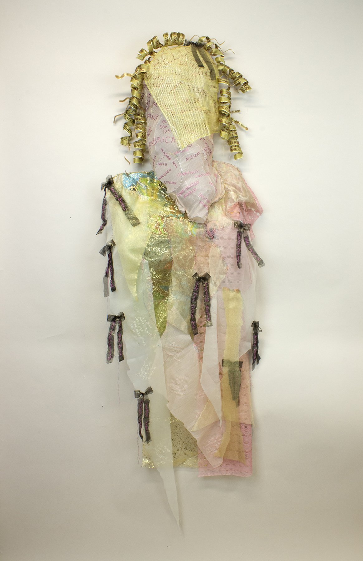    The Flower of the South,   crushed and reclaimed old work (steel, ceramic, thread, paper, acrylic), reclaimed food net/fabric/thread/paper/ribbon, steel, thread, 65 x 19 x 9 inches 