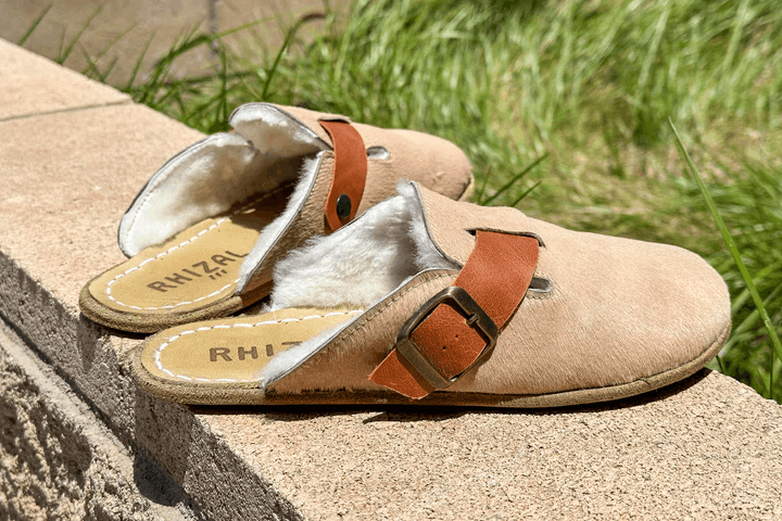 Rhizal kuyu cowhides sheepskin lifestyle wall 2 min.png