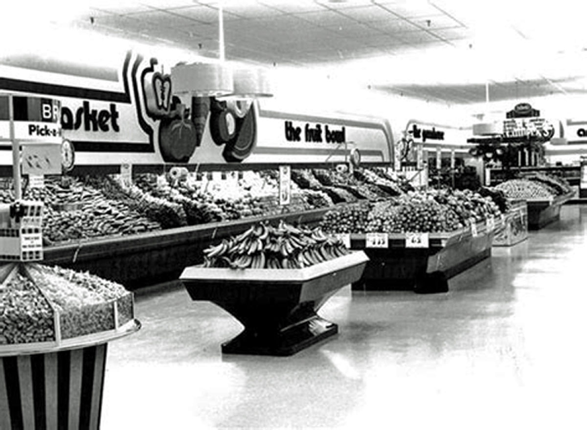 Calbeck's fourth store in Brantford opened at the North Park Plaza on Fairview Drive in 1979. This photo shows the in direct lighting used in the store. The lights fixtures hang down from the ceiling and cast the light upwards to reflect off the ceiling. Image courtesy of the Brant Historical Society