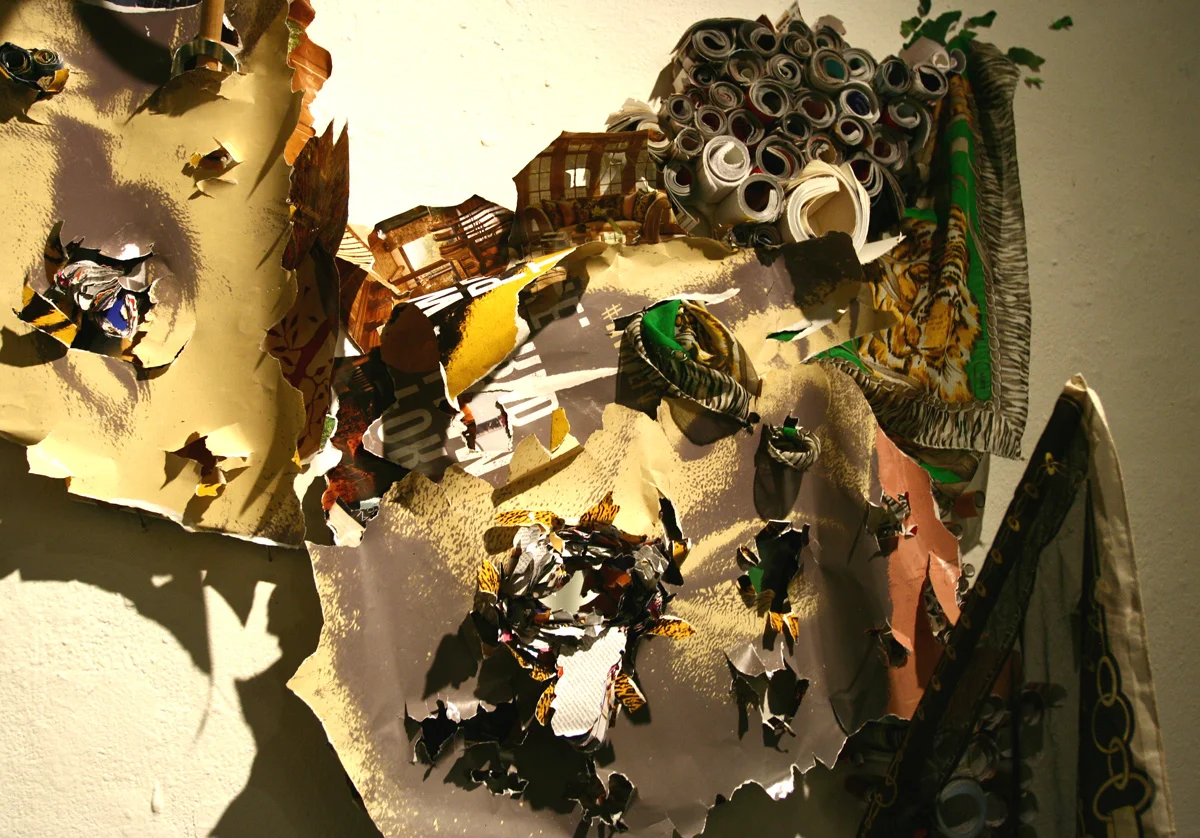 No Man's Land, 2013 Book, magazine cutouts, scarves, mirror, 75 x 125 x 40 inch
