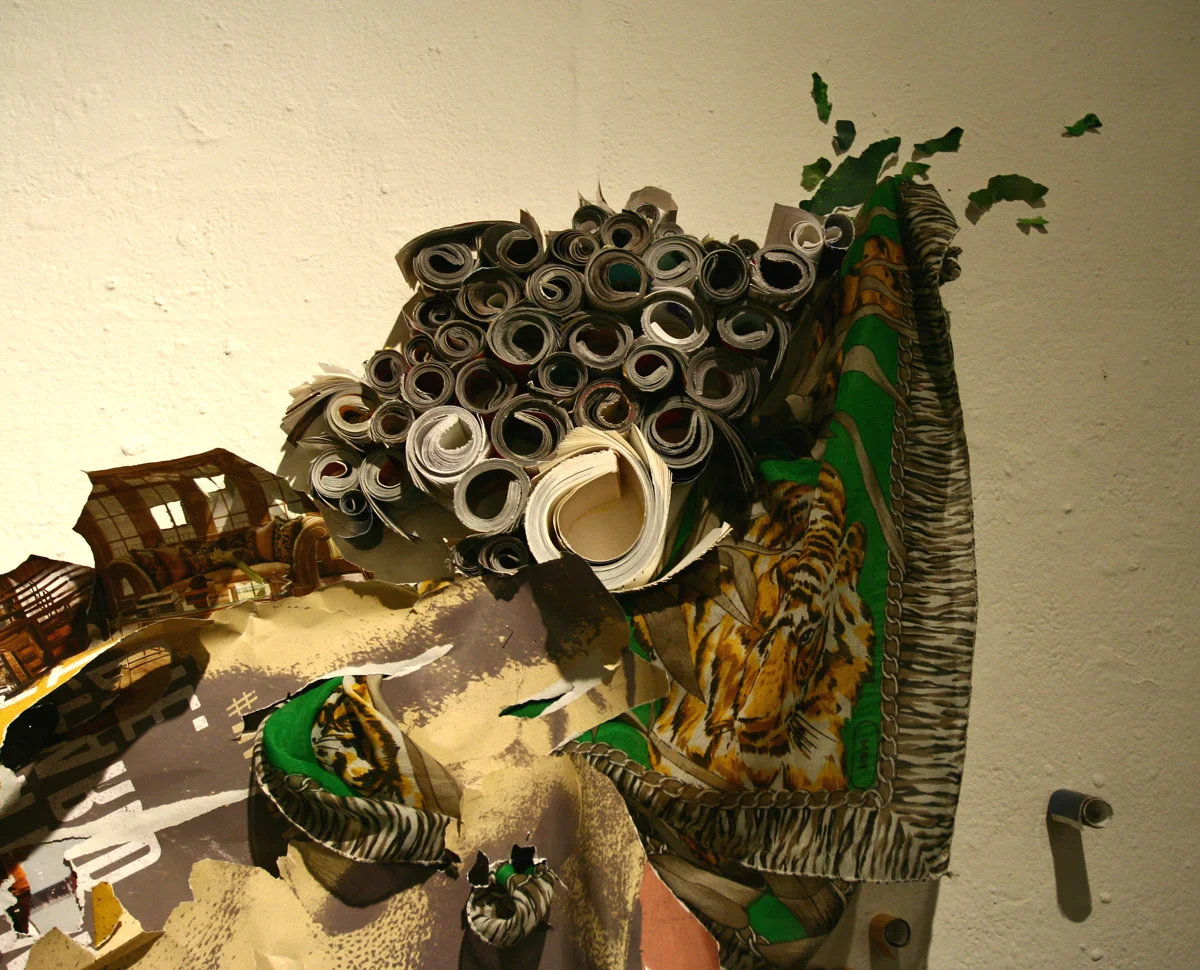 No Man's Land, 2013 Book, magazine cutouts, scarves, mirror, 75 x 125 x 40 inch
