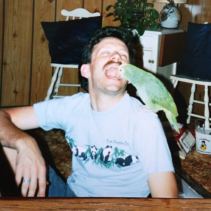 Despite Oliver's narcissism and hideous halitosis, Heather still enjoyed his company and shoulder. Oliver's public displays of affection toward Heather stood in stark contrast to his continued failure to ever connect with any human. Their connection affected Heather's neurolinguistic pathways in a deep and permanent manner. Heather's squawks changed key; she produced sound never before heard in nature. Oliver opened The Cross-Species Communication Institute (CSCI) in Carson City, NV. Heather is in the CSCI logo.