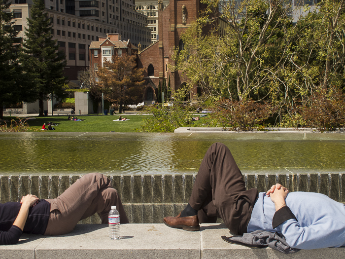 Enjoying the sun during their lunch break. Yerba Buena Gardens. San Francisco, CA by Stella Kalaw