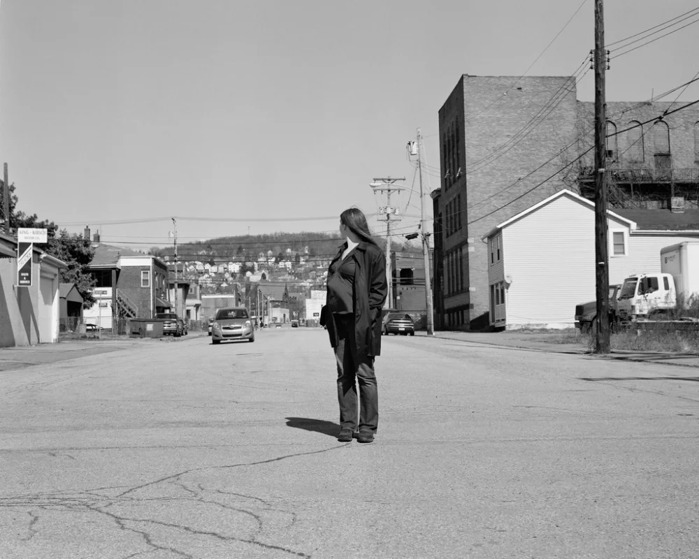 Shaunna with child, Braddock, PA; 2011