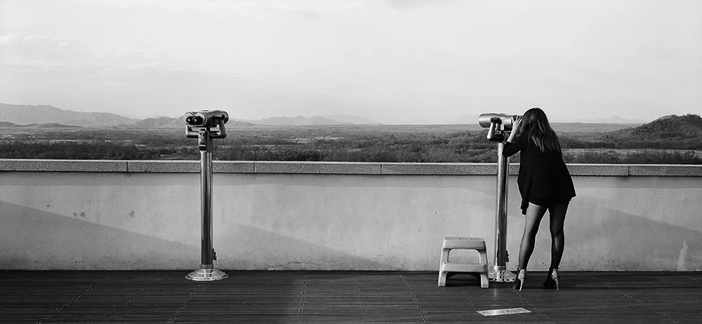 Woman looking at North Korea
