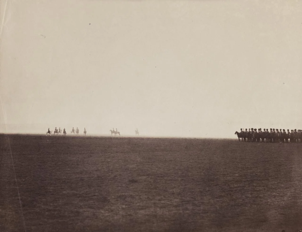 Gustave Le Gray, French (1820–1884). Cavalry maneuvers, Camp de Châlons , 1857. Albumen print, 10 3/16 × 13 1/8 inches. The Nelson- Atkins Museum of Art, Kansas City, Missouri. Gift of the Hall Family Foundation, 2017.61.20.